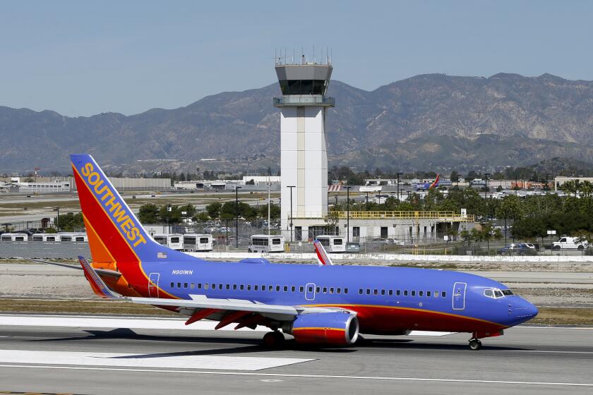 A Southwest airplane lands in Burbank on March 24, 2016.