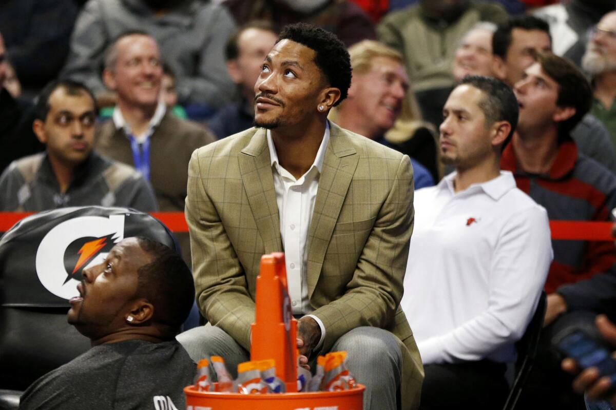 Chicago guard Derrick Rose sits on the bench during the first half of a game against the Indiana Pacers on Nov. 15. Rose has appeared in five games for the Bulls this season.