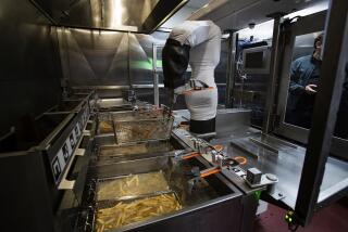 speech to text google docs app PASADENA CA - JANUARY 28, 2020: Flippy the robot demonstrates its ability to man a fry station at Miso Robotics on January 28, 2020 in Pasadena, California.(Gina Ferazzi/Los AngelesTimes)