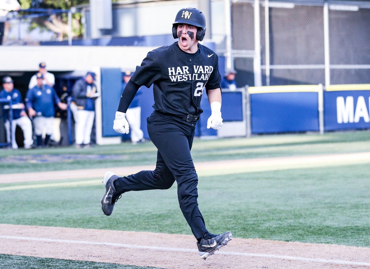 Bryce Rainer of Harvard-Westlake celebrates after hitting a home run in the sixth inning of a 2-1 loss 