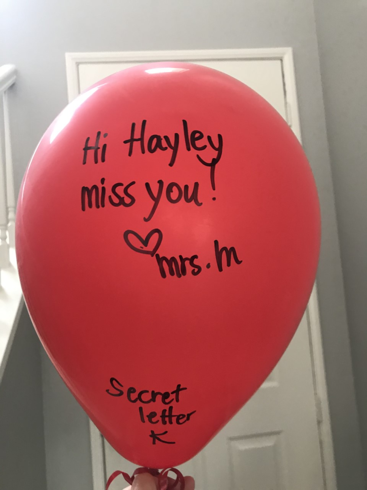 Teacher Holly Morey brought balloons to her students with sweet messages.