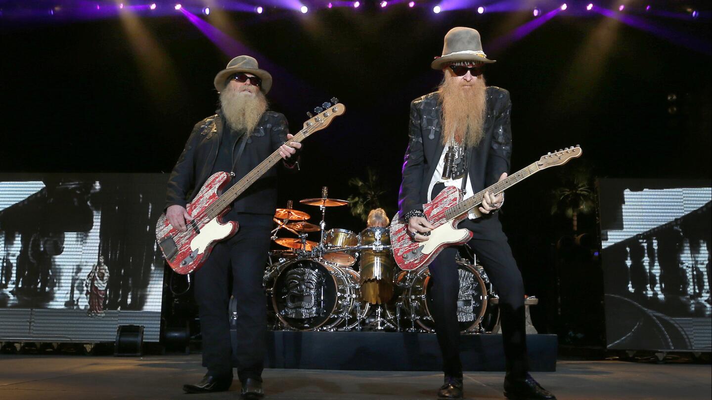ZZ Top bassist Dusty Hill, left, and guitarist Billy Gibbons perform on the Palomino Stage.