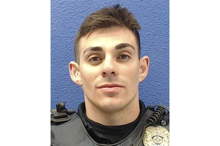 Former Las Cruces Police officer Christopher Smelser