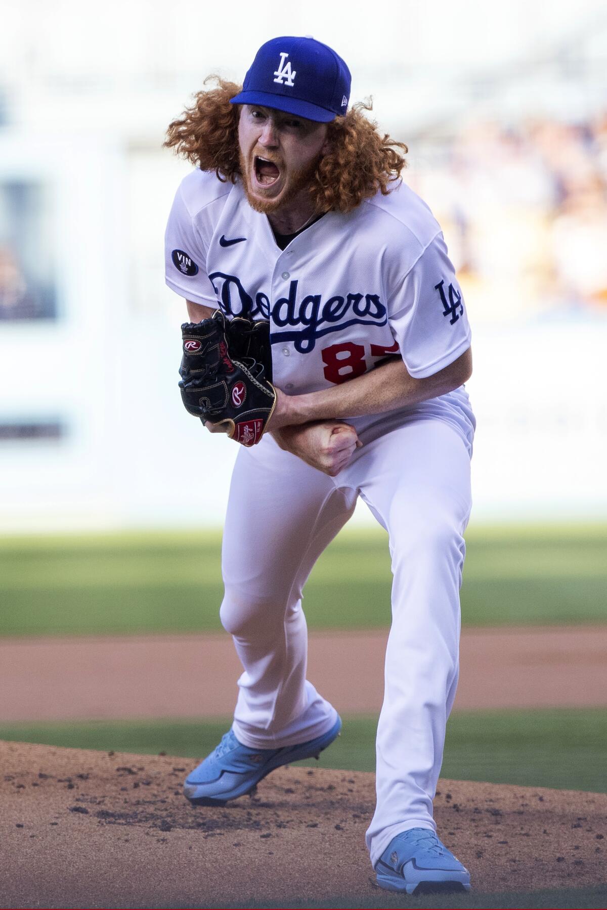Dodgers starter Dustin May is fired up after he struck out the Marlins' Nick Fortes during the first inning Aug. 20, 2022. 