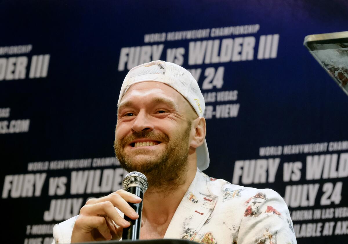 WBC heavyweight champion Tyson Fury talks during a news conference on June 15, 2021