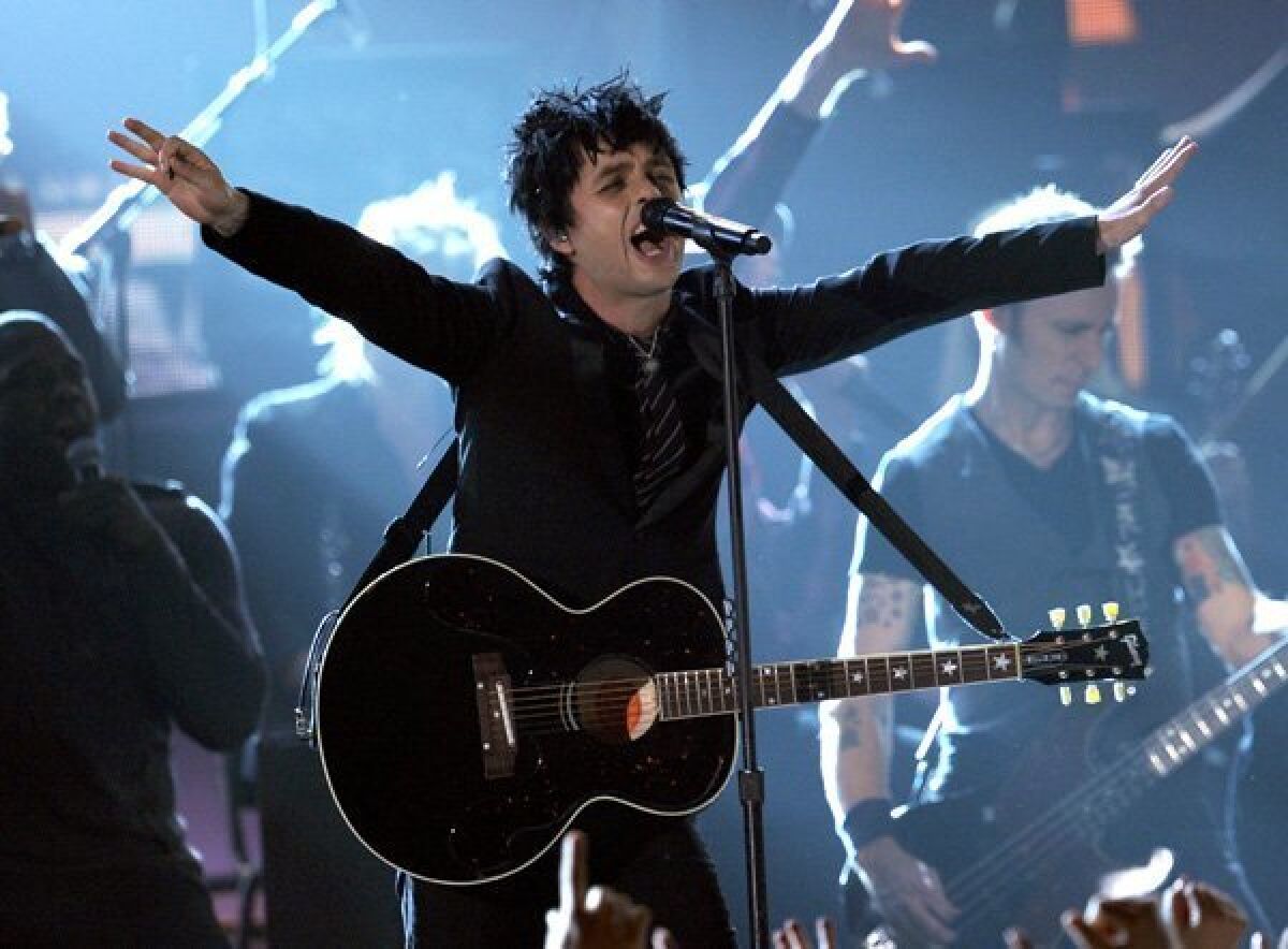 Billie Joe Armstrong of Green Day performs onstage during the 52nd Annual GRAMMY Awards. His band's 2020 Hella Mega tour has been pushed back to next year because of the coronavirus pandemic.