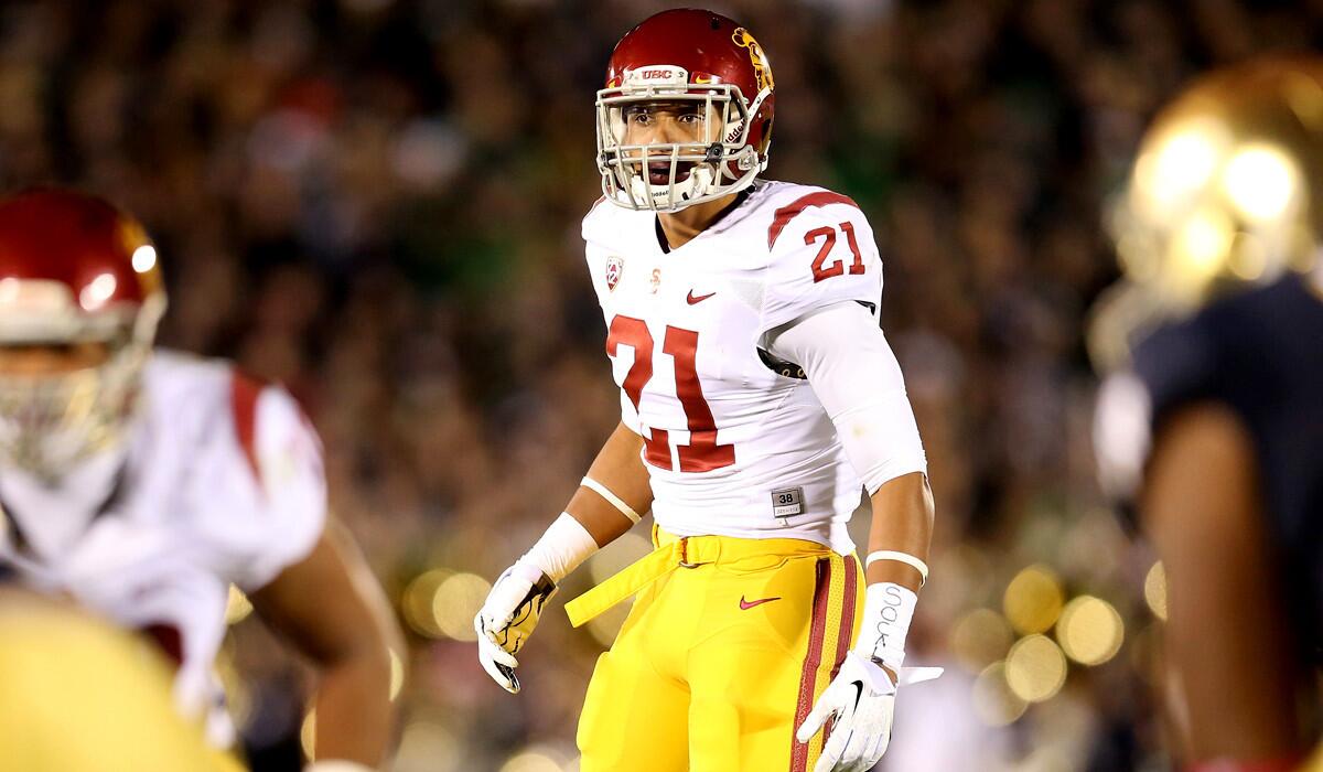 USC safety, and sometimes linebacker, Su'a Cravens (21) prepares for a play against Notre Dame last season.