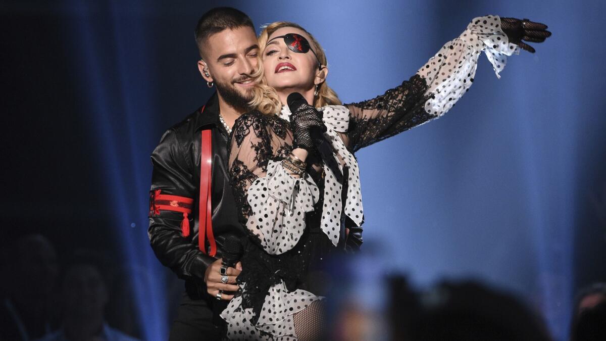Maluma, left, and Madonna perform "Medellín" at the Billboard Music Awards earlier this month.