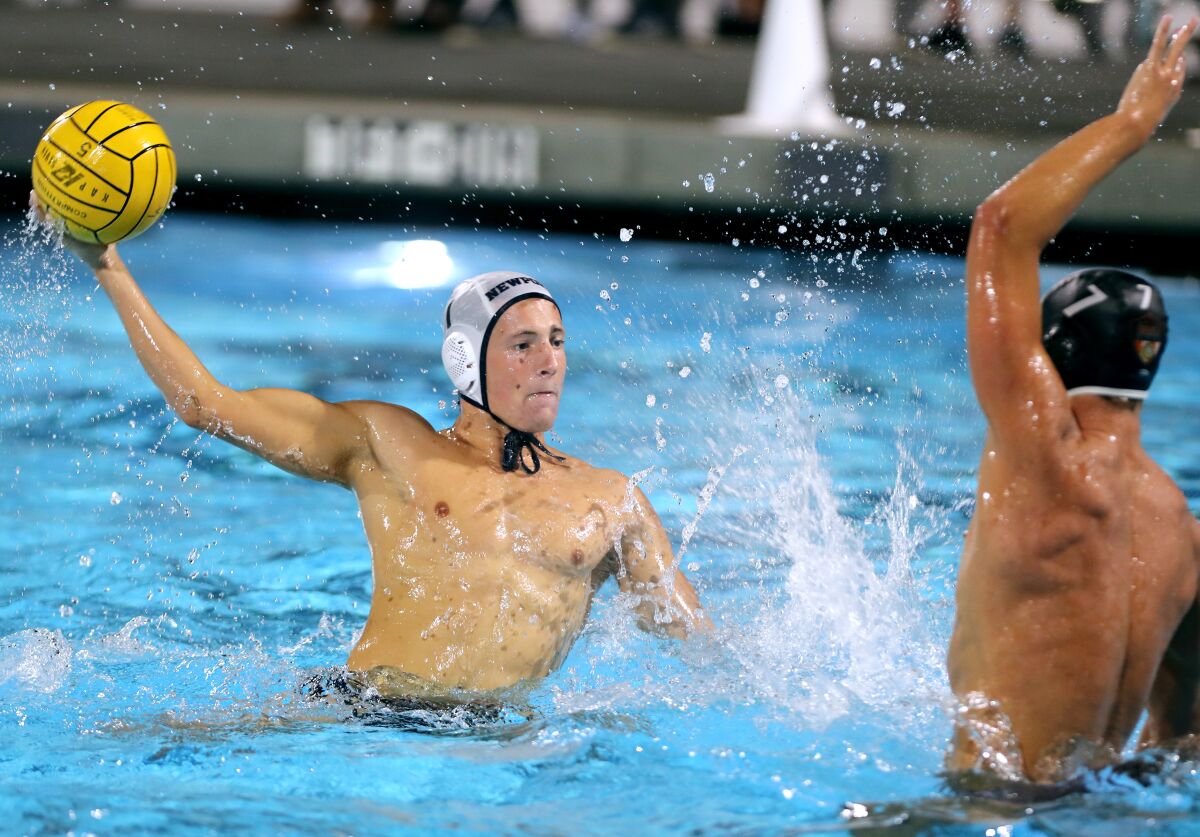 Mason Hunt takes a shot on goal in a game against rival Huntington Beach on Oct. 27.