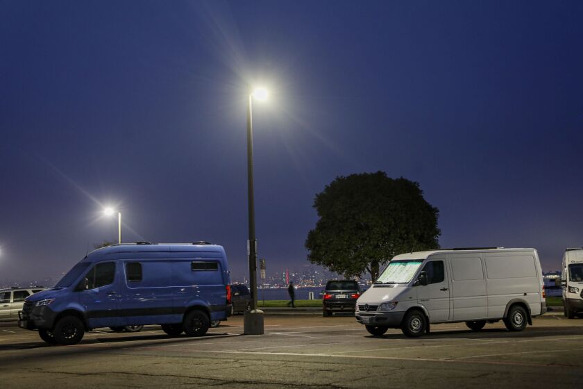 SAN DIEGO, CA-APRIL 10: Camper vans sit in a parking lot along Shelter Island on Monday, April 10, 2023 in San Diego. (Photo by Sandy Huffaker for The San Diego Union-Tribune)