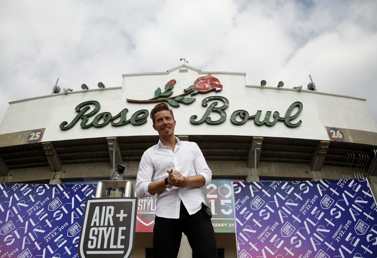 Olympic champion Shaun White poses for photographers after he announced a two-day event called "Air + Style," that will take place in February 2015 at the Rose Bowl in Pasadena.