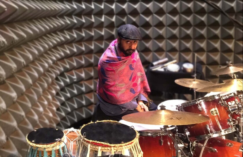 Musician Deep Singh in a recording studio.