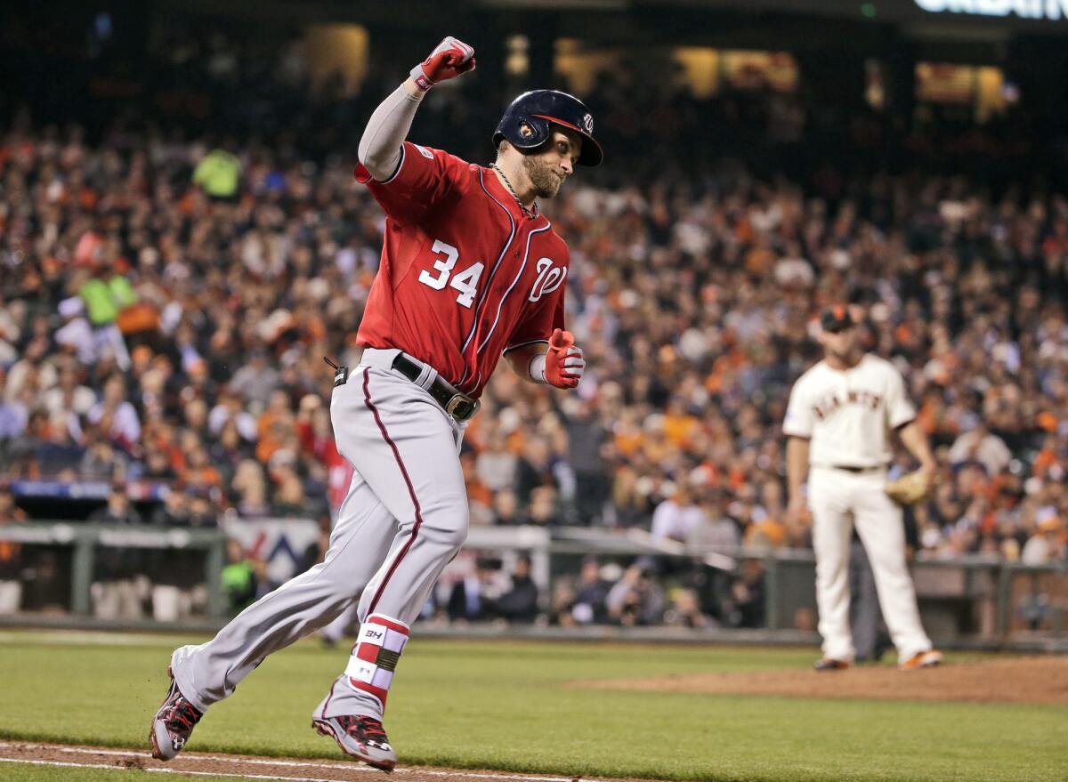 Nationals outfielder Bryce Harper celebrates a home run against the Giants in the playoffs last season.