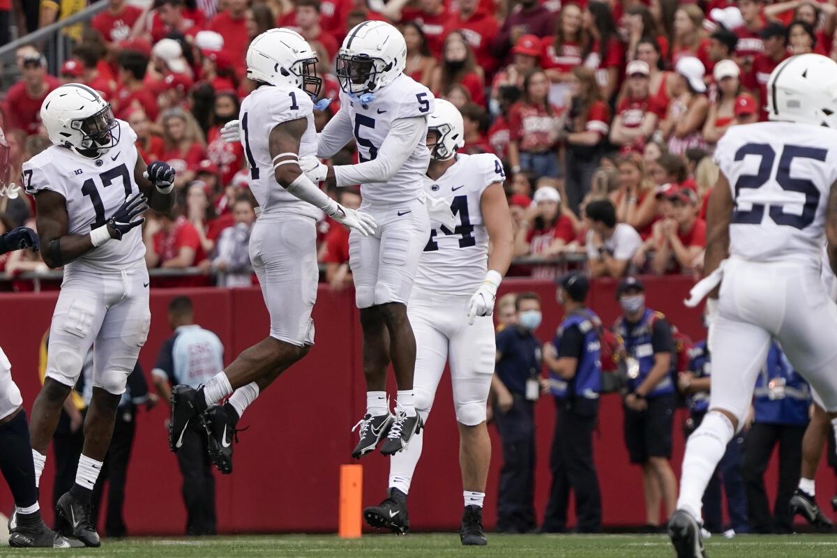 Penn State's Jaquan Brisker celebrates his interception during the second half of an NCAA college football game against Wisconsin Saturday, Sept. 4, 2021, in Madison, Wis. Penn State won 16-10. (AP Photo/Morry Gash)