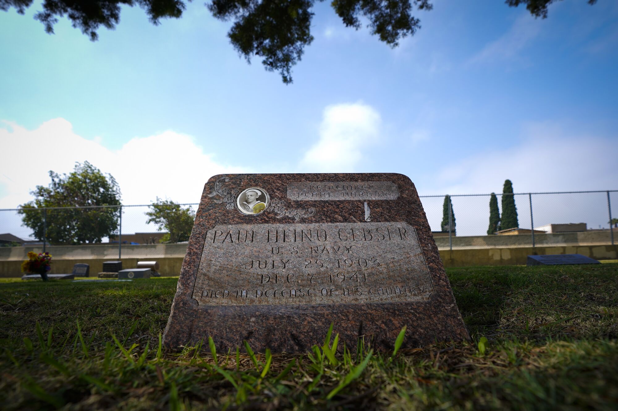 Paul Heino Gebser's gravestone features his photograph.