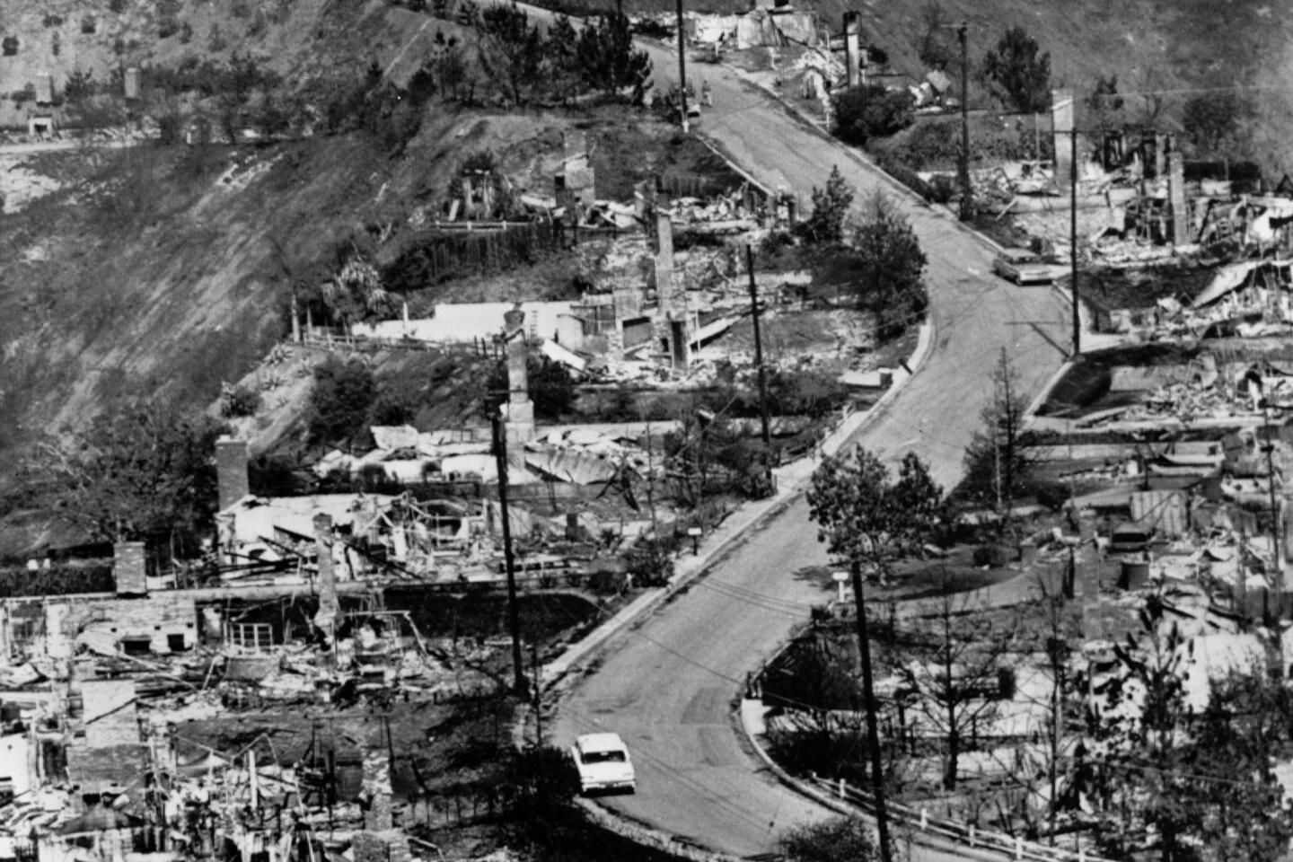 Burned-out homes line both sides of a Bel-Air street