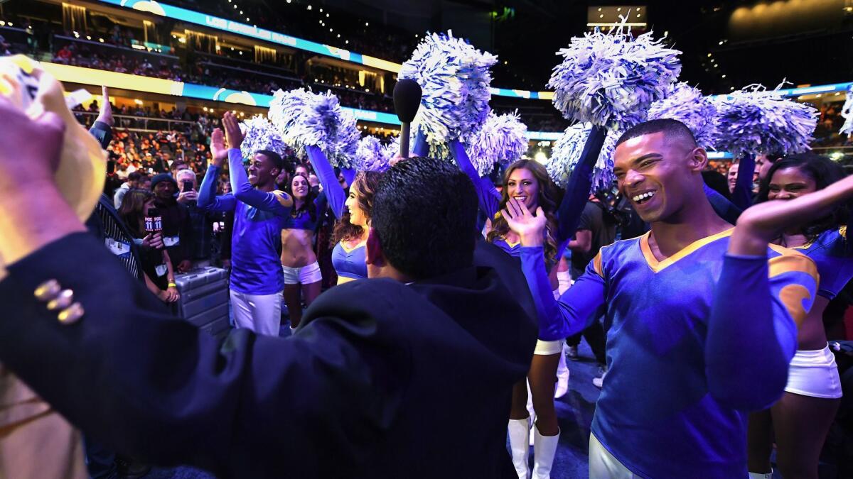 PHOTOS: Rams make history with first male cheerleaders in Super