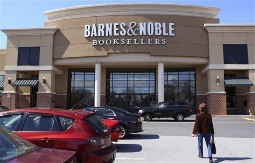 In this March 20, 2008 file photo, a Barnes & Noble Booksellers store is seen in Camp Hill, Pa. Bookseller Barnes & Noble Inc. swung to a loss in its third quarter, saying Thursday, Nov. 20, 2008, that "a significant drop-off" in traffic and consumer spending hurt business. The company also reduced its full-year sales and earnings forecasts. (AP Photo/Carolyn Kaster, File)