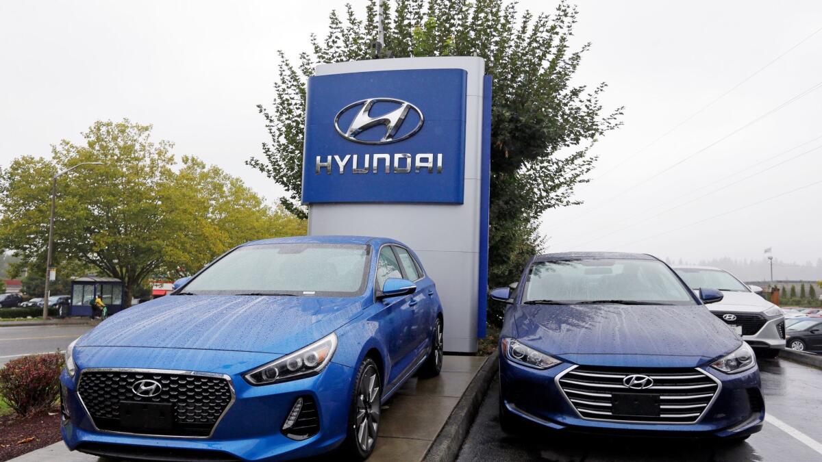 Hyundai has moved aggressively toward using online transactions to ease the often time-consuming process of buying a new car. Here, Elantra sedans wait for new owners outside a dealership in Kirkland, Wash.