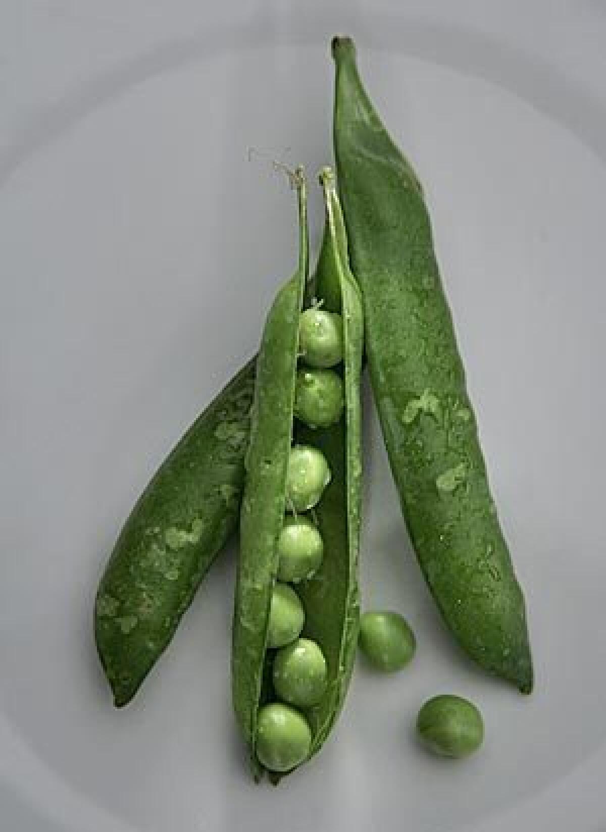 For a quick fix, simmer the peas in their pods in a skillet with about 1 inch of water and a nice chunk of butter.