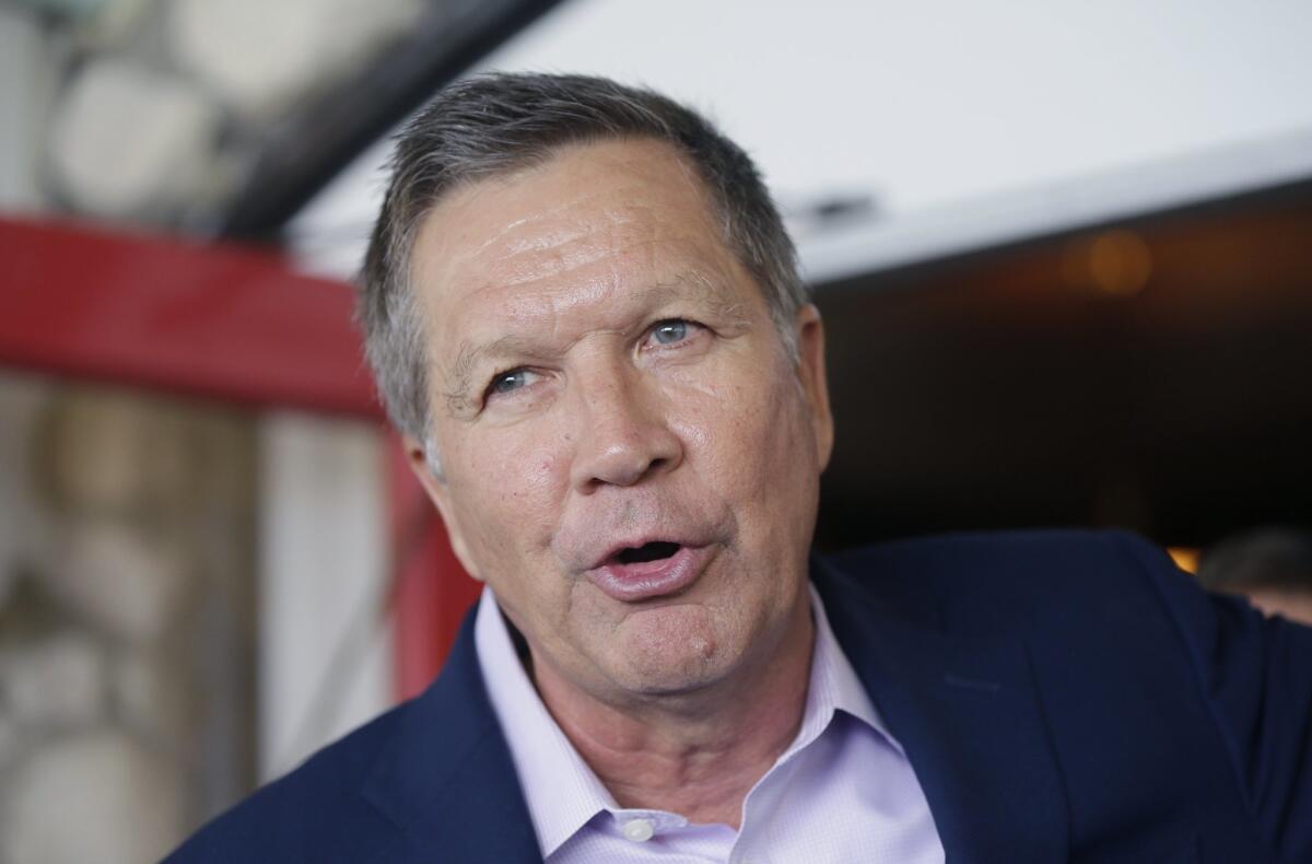 Republican presidential candidate, Ohio Gov. John Kasich addresses supporters during a reception at the 2016 Mackinac Republican Leadership Conference, Saturday, Sept. 19, 2015, in Mackinac Island, Mich. (AP Photo/Carlos Osorio)
