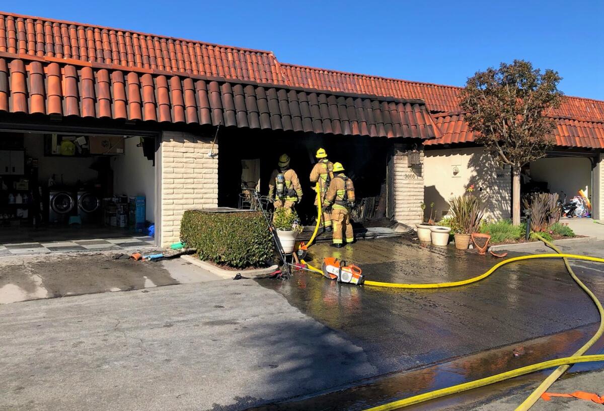 Costa Mesa firefighters responded Sunday to a Mesa Verde condominium, where a fire broke out inside a garage.