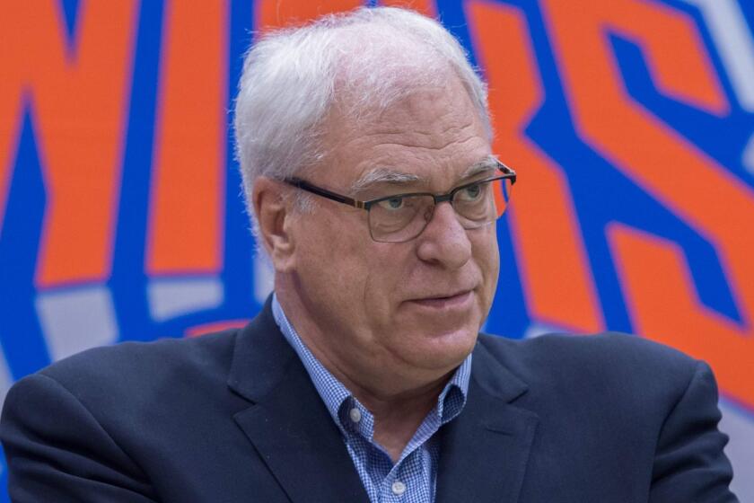 New York Knicks President Phil Jackson speaks to reporters at Madison Square Garden in July.