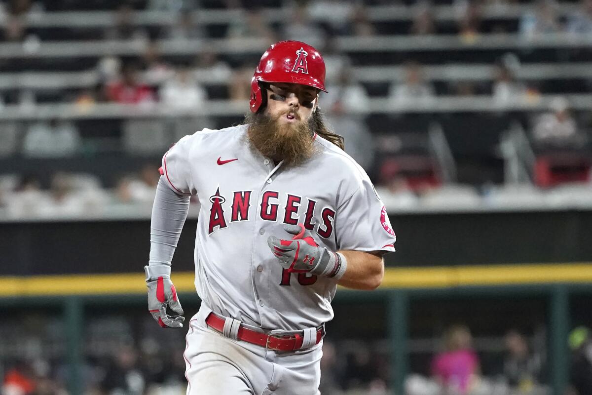 Angels set tone early, hold on to beat White Sox