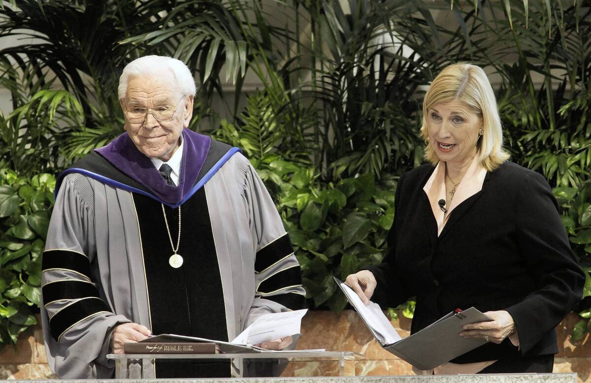 The Rev. Robert H. Schuller and his daughter, Sheila Schuller Coleman, appear on a video screen as they address the congregation at the Crystal Cathedral in Garden Grove during services in 2010.