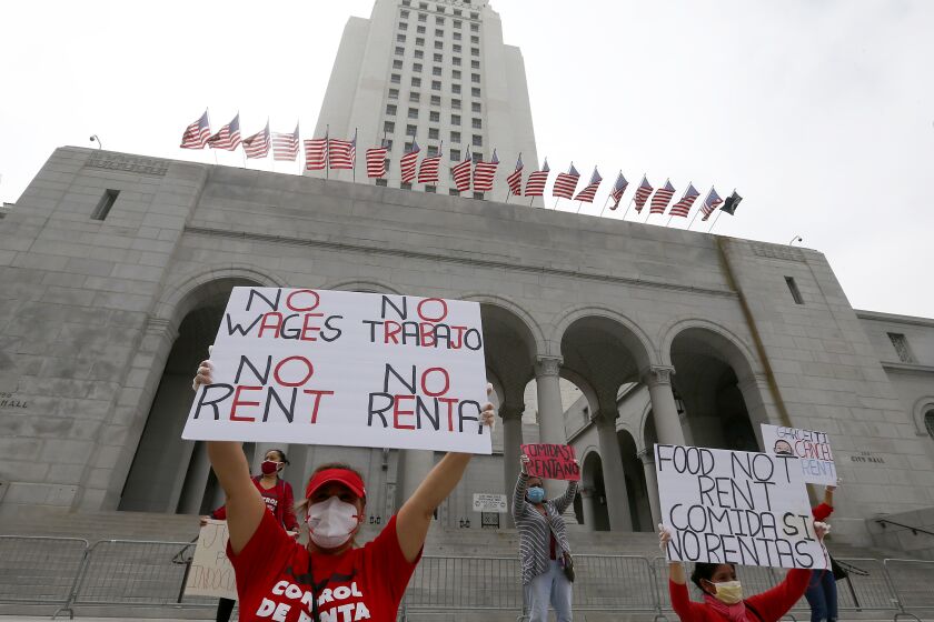 LOS ANGELES, CALIF. - APR. 30, 2020. Tenants and their supporters from across Los Angeles gather at city hall on Thursday, Apr. 30, 2020, to call on L.A. Mayor Eric Garcetti, the L.A. City Council, and California Gov. Gavin Newsom to cancel rent and mortgage payments during the COVID-19 crisis. (Luis Sinco/Los Angeles Times)