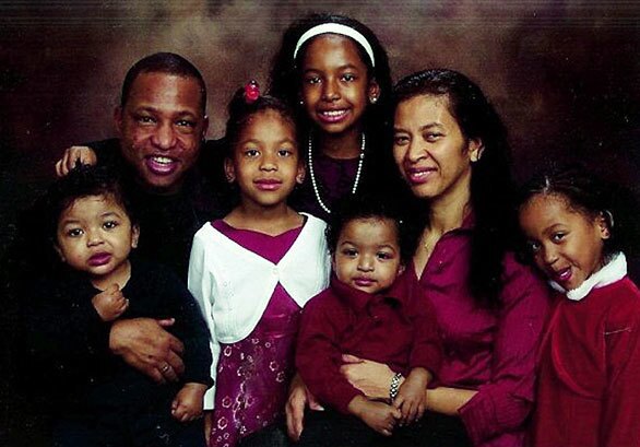 This undated photo obtained Tuesday, Jan. 27, 2009 from Ervin Antonio Lupoe's Facebook Web page shows Ervin Antonio Lupoe, top left, his wife, Ana, top right, and their five children: Brittney, top, twin girls Jaszmin and Jassely and twin boys Benjamin and Christian. The exact identification of the sets of twins is not known.