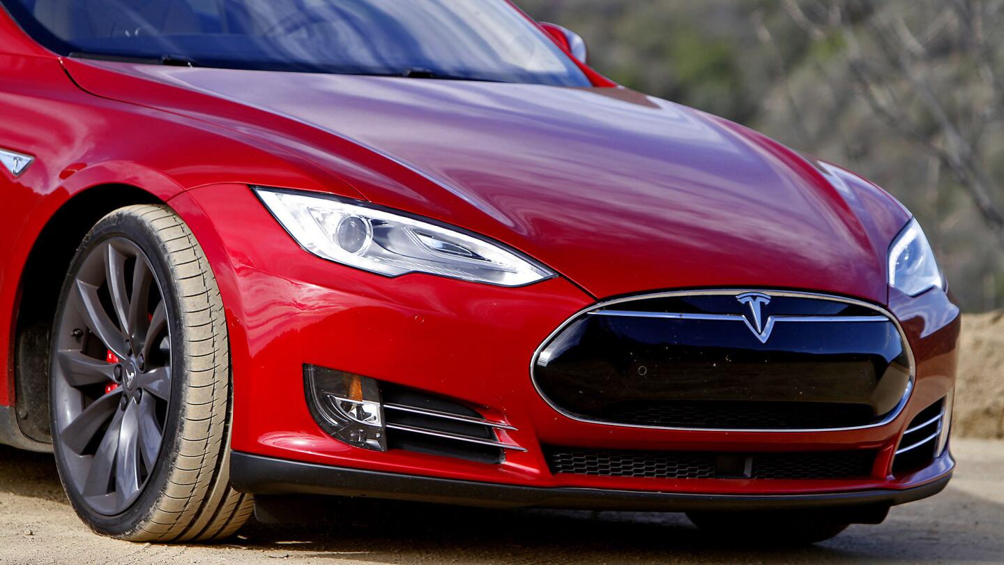 The new Tesla Model S P85D produces extra power with the addition of a second electric motor putting out the equivalent of 691 horsepower. It's priced at $104,500.
