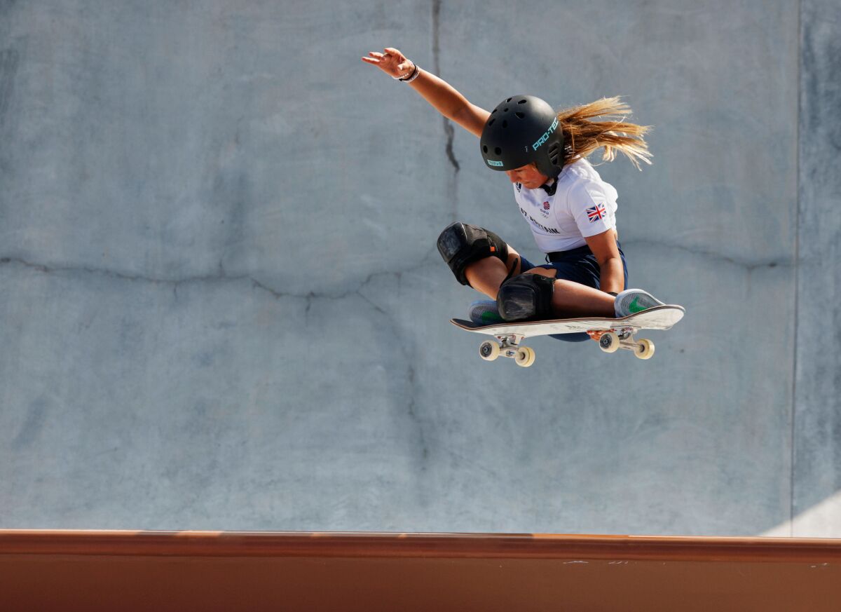 Sky Brown of Team Great Britain gets inverted during training at Ariake Skateboard Park in Tokyo.