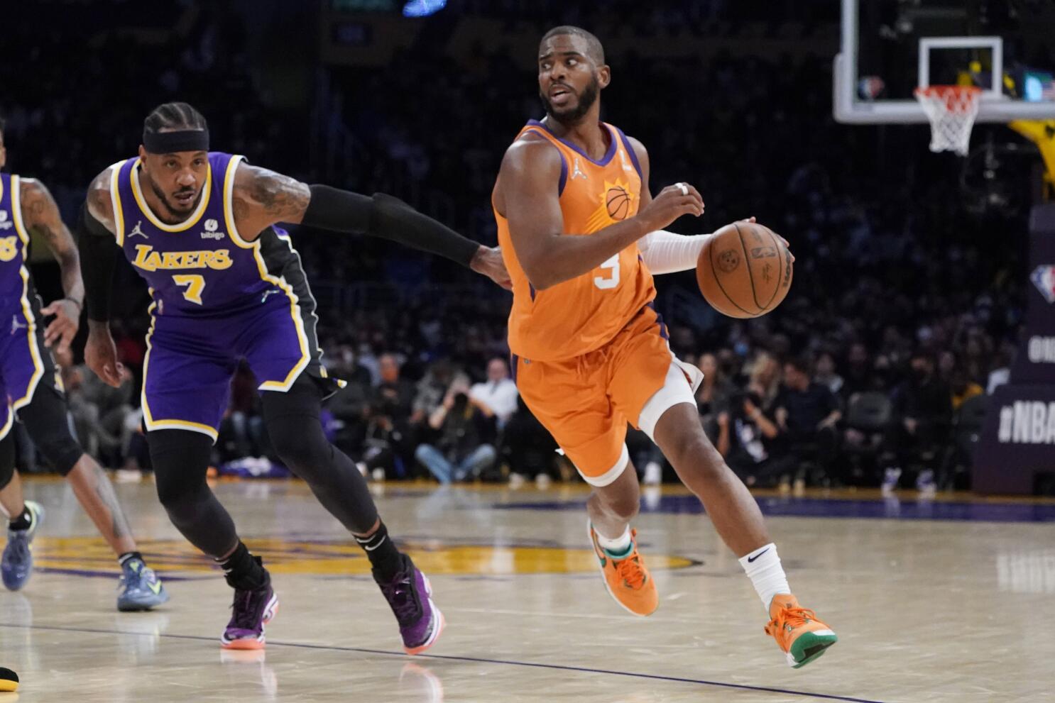 Chris Paul of the Phoenix Suns dribbles the ball against the