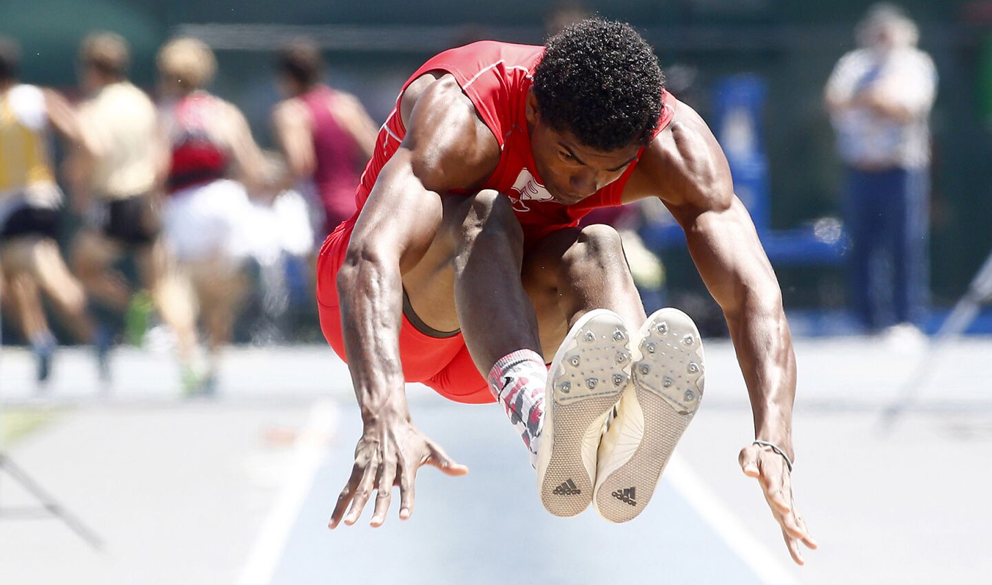 Rancho Verde's Bryan Thompson comepetes in the Division 1 boys' long jump during the CIF Southern Section finals at Cerritos College.