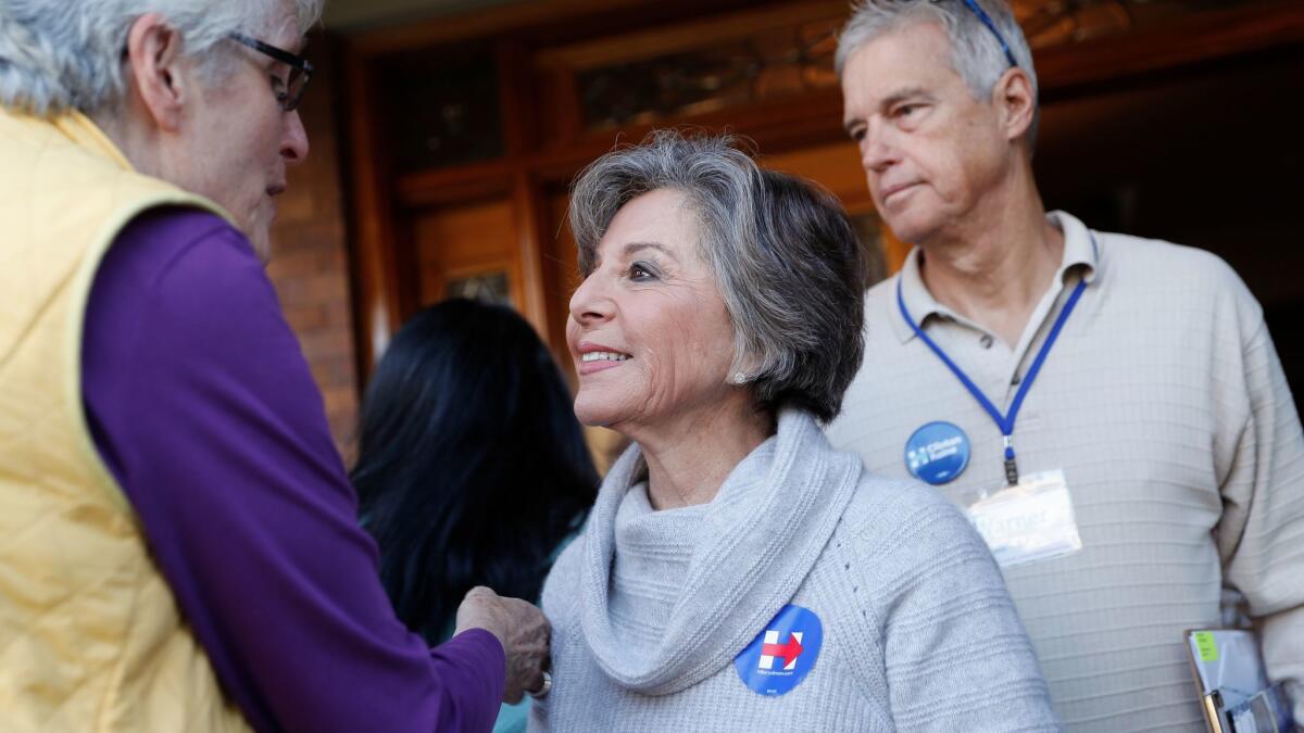Retiring Sen. Barbara Boxer, D-Calif., center, at a canvassing site to train and organize supporters of Democratic presidential candidate Hillary Clinton on Oct. 29.