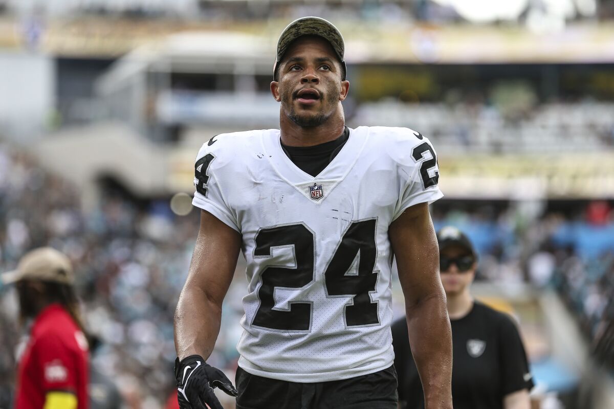 FILE - Las Vegas Raiders safety Johnathan Abram (24) walks off the field at halftime of an NFL football game against the Jacksonville Jaguars on Sunday, Nov. 6, 2022, in Jacksonville, Fla. The Packers claimed Abram off waivers this week from the Raiders, who had taken him with the 27th overall pick in the 2019 draft. Abram becomes the third former Raider to join Green Bay since the Packers hired ex-Raiders interim head coach Rich Bisaccia as special teams coordinator. (AP Photo/Gary McCullough, File)
