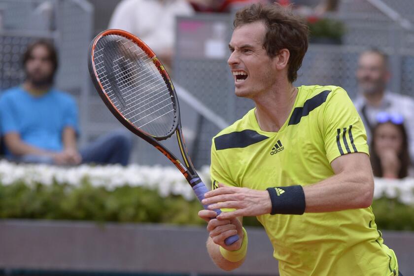 Andy Murray reacts to a wayward shot during his loss to Santiago Giraldo on Thursday at the Madrid Open.