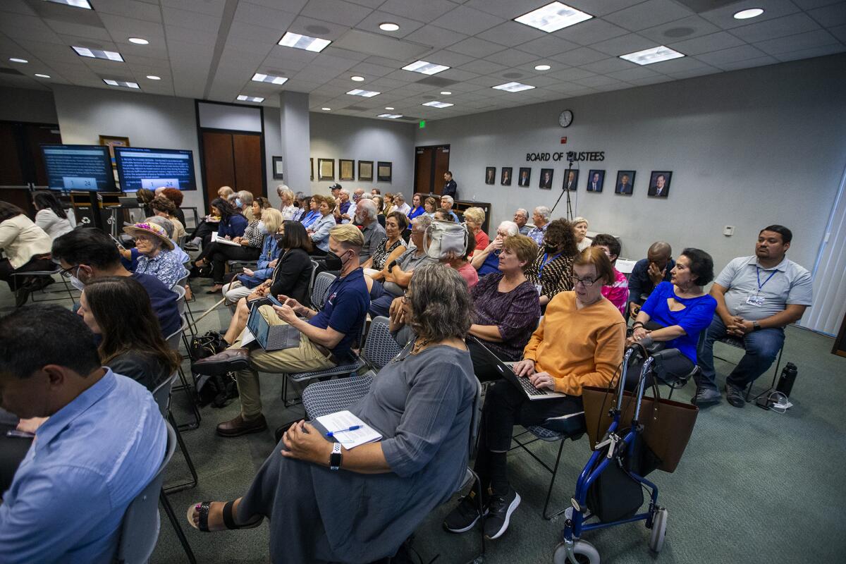 Rancho Santiago Community College District retirees attend a board meeting on Monday, April 25.