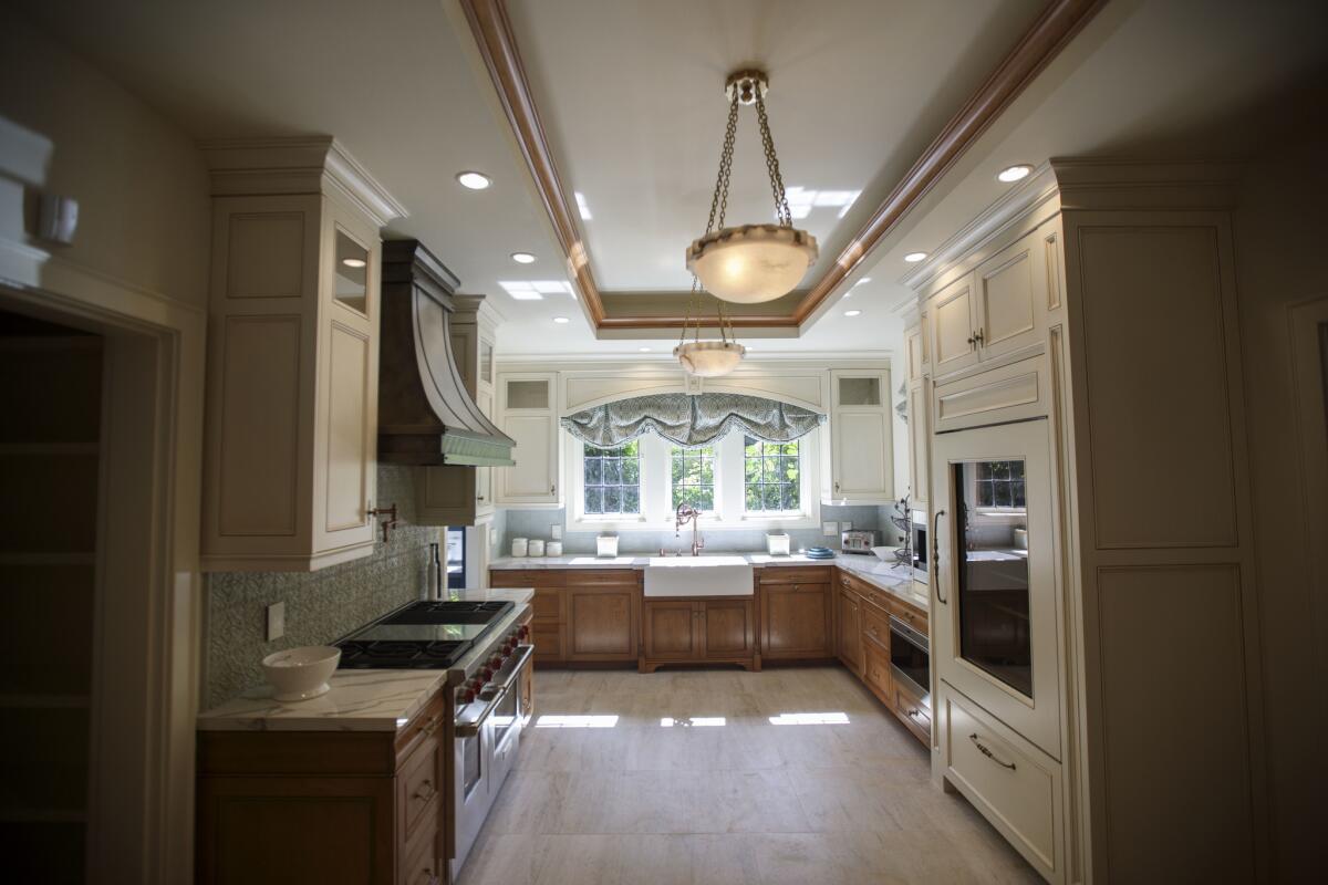 The kitchen by D Christjan Fine Cabinetry Design & Manufacturing, after renovations. (Patrick T. Fallon / For The Times)