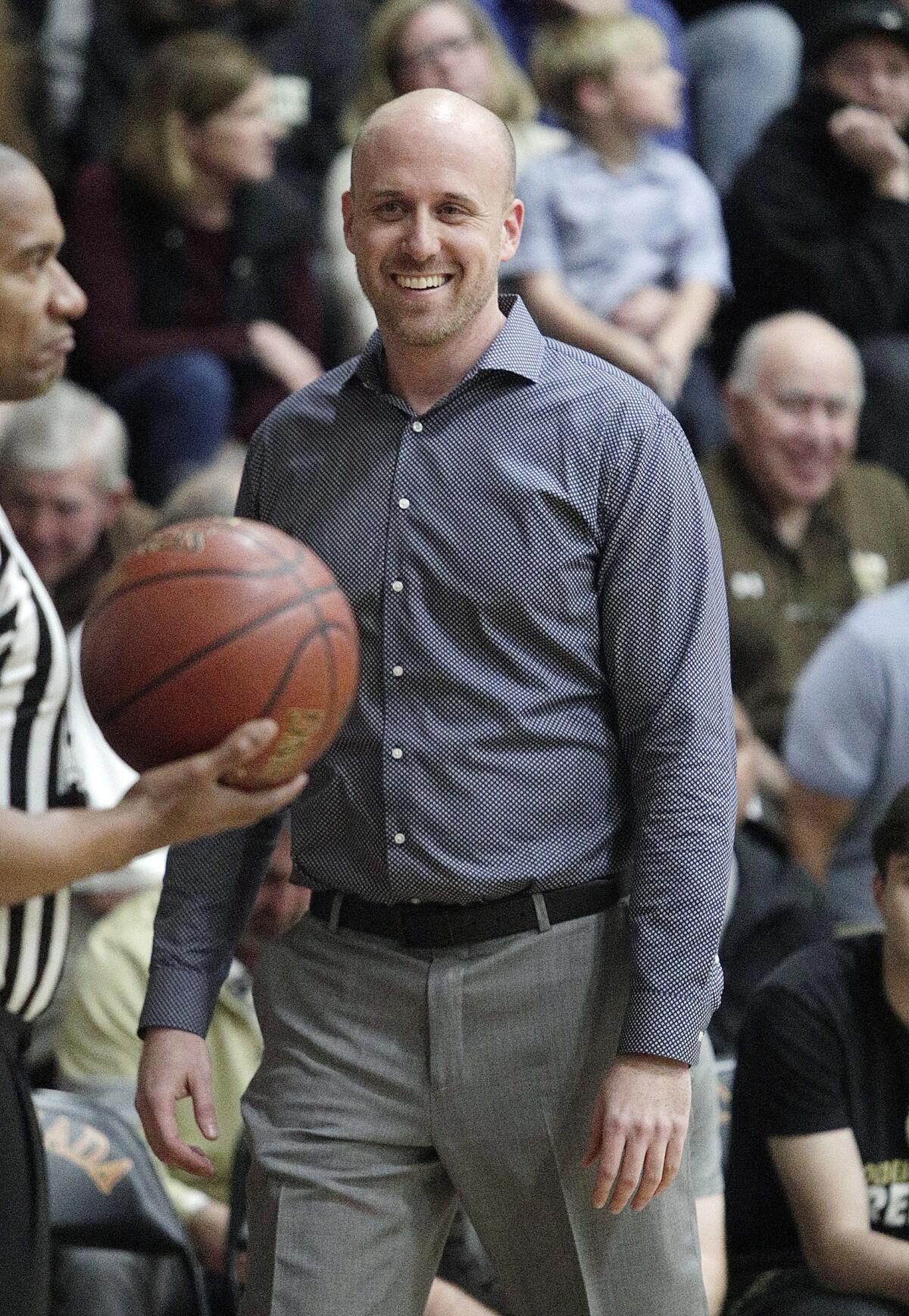 St. Francis' head coach Todd Wolfson smiles at the referee after a no-call in the game with La Canada in CIF Southern Section Division II-A first-round boys' basketball playoff at La Canada High School on Wednesday, February 12, 2020.