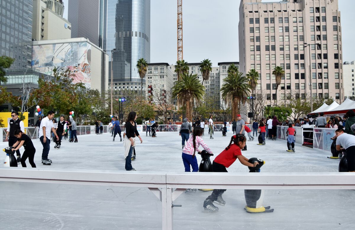 A skating rink full of people.