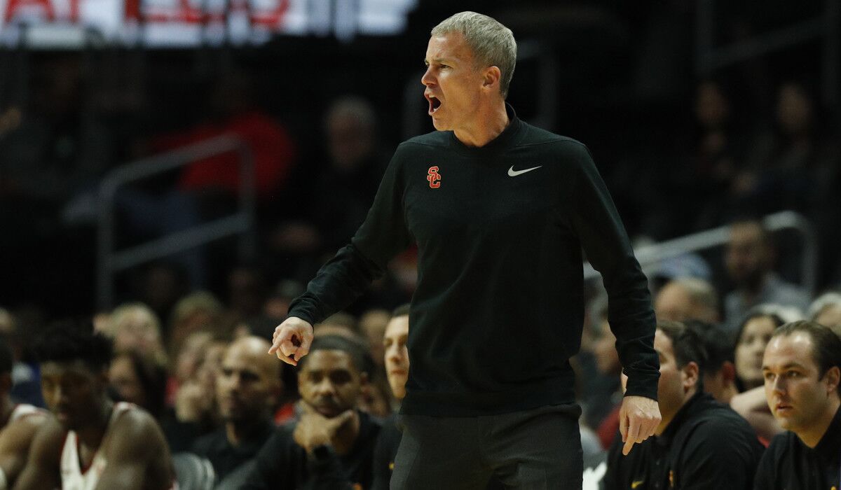 USC coach Andy Enfield argues a non-call against Oklahoma during the Basketball Hall of Fame Classic at Staples Center on Dec. 8, 2017.