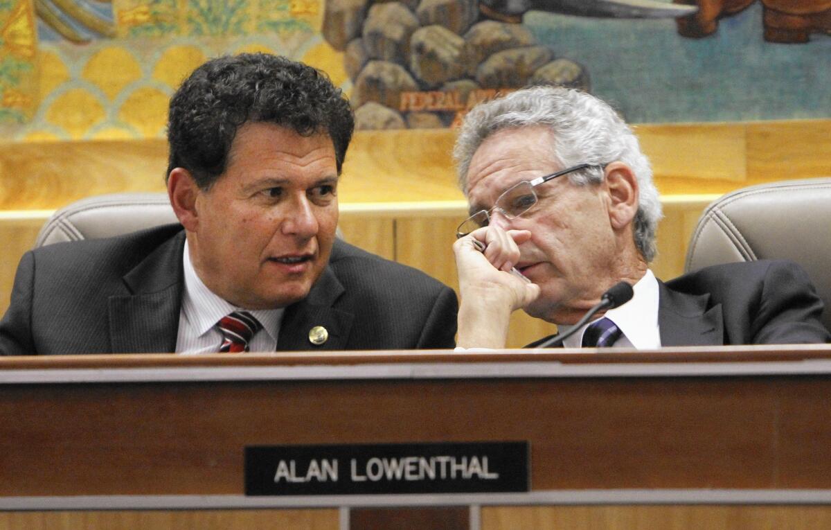 State Sen. Marty Block, left, seen with Sen. Alan Lowenthal in 2011, says the State Bar of California should require unaccredited law schools to disclose alumni employment details as well as attrition rates.