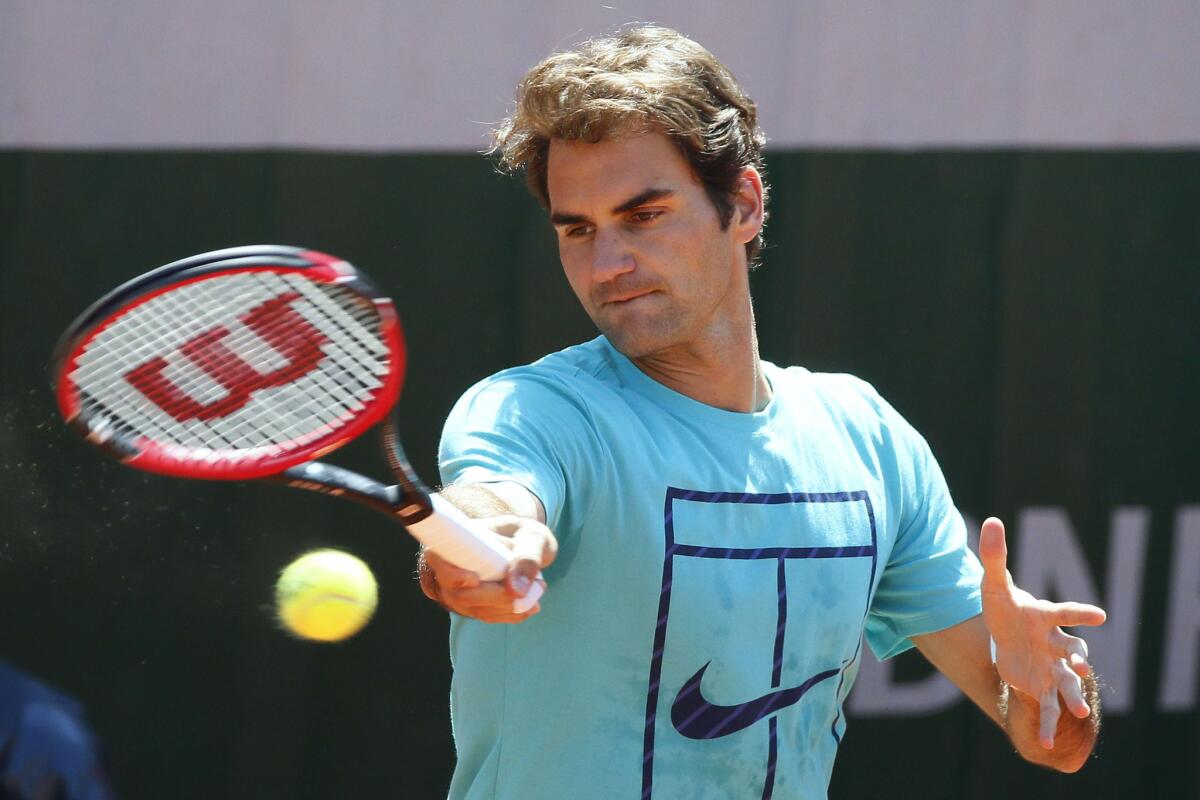 Roger Federer of Switzerland works out during a training session Saturday ahead of the French Open.