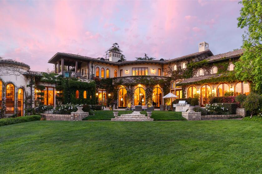 The 1.8-acre spread centers on a 16,700-square-foot villa built by Richard Landry.