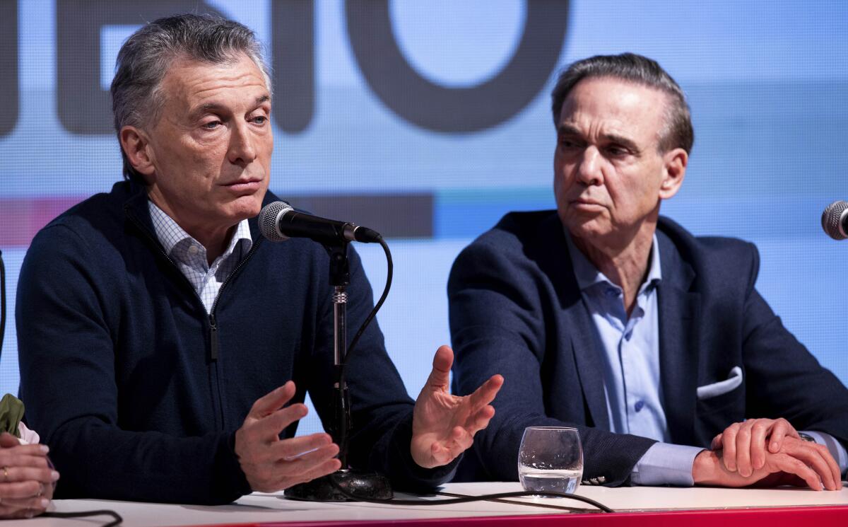 Argentine President Mauricio Macri and running mate Miguel Angel Pichetto