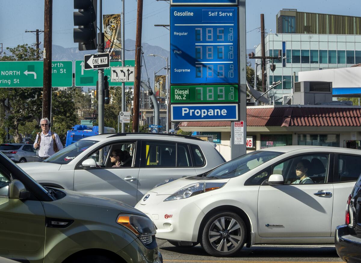 Cars in downtown Los Angeles pass a station selling gasoline for nearly $8 per gallon on June 1. 