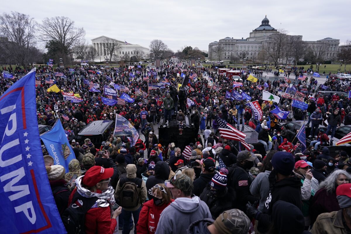 Protesters gather outside the Wednesday in Washington before many of them stormed the Capitol.