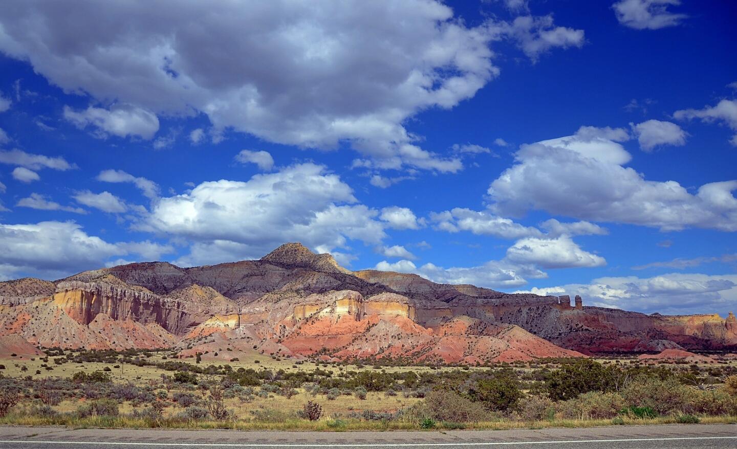 On its way from Pagosa Springs, Co., to Santa Fe, N.M., U.S. 84 runs through a dramatic landscape that includes the New Mexico town of Abiquiu, Abiquiu Lake and the Ghost Ranch, about 15 miles north of Abiquiu. These mountains stand near the entrance to Ghost Ranch.